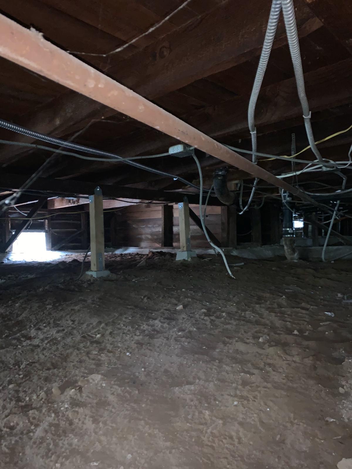911 Attic Insulation technician working in an attic