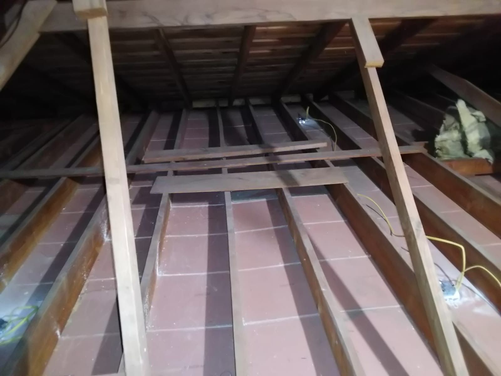 Clean attic after insulation removal