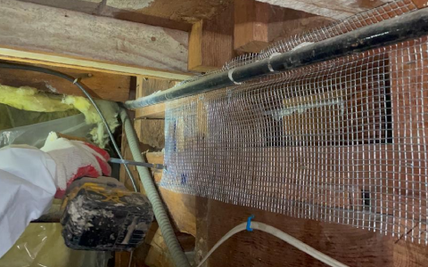 Radiant barrier reflecting attic heat